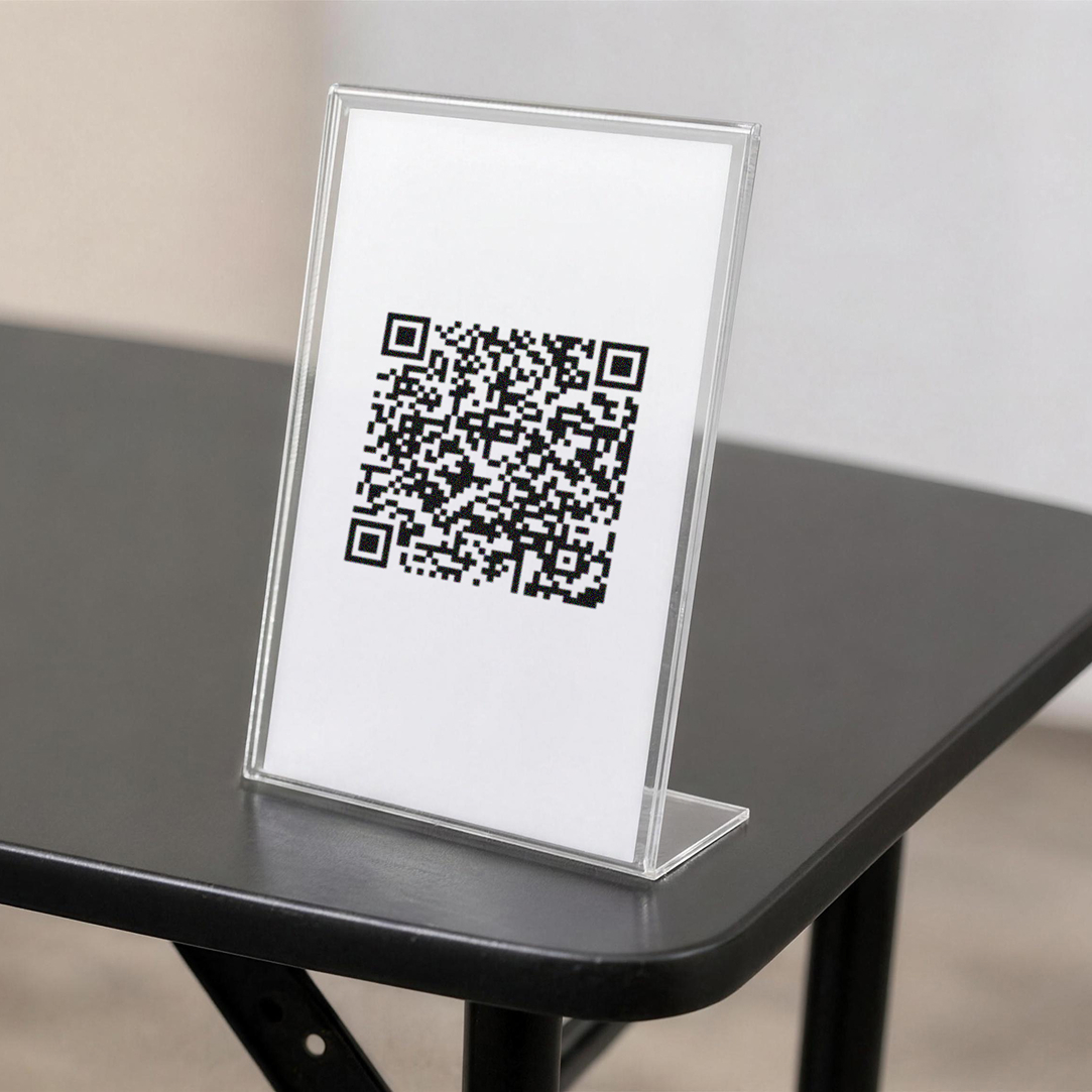 QR code displayed on an acrylic stand at a card booth